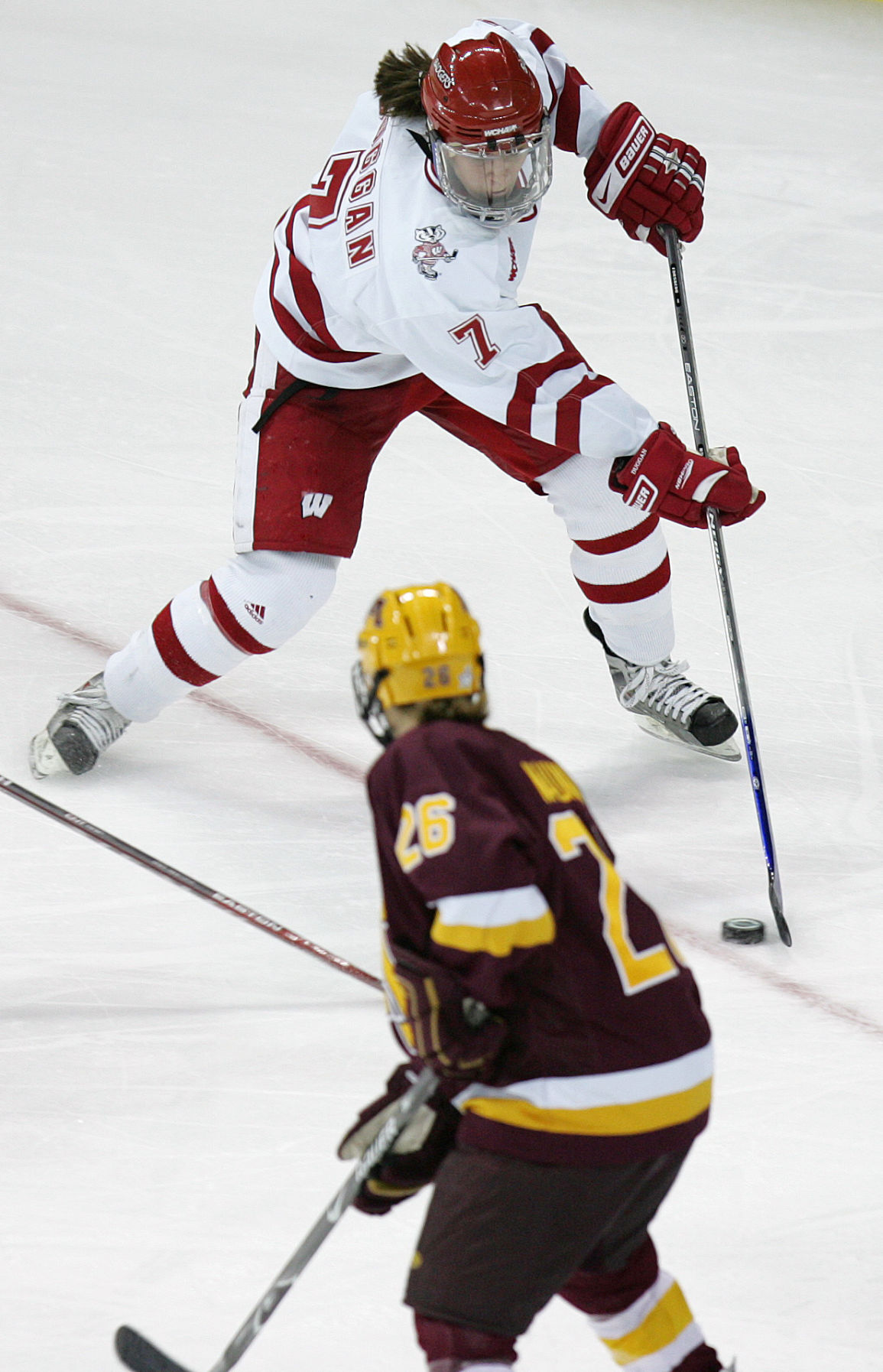 Handling the puck against Minnesota